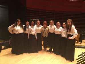 Jessica O'Neill '13 poses with her students from Little Flower CHS.